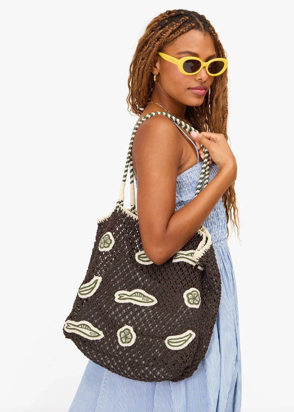 person wearing Clare V. womens L'Été Tote in Chocolate Multi Applique