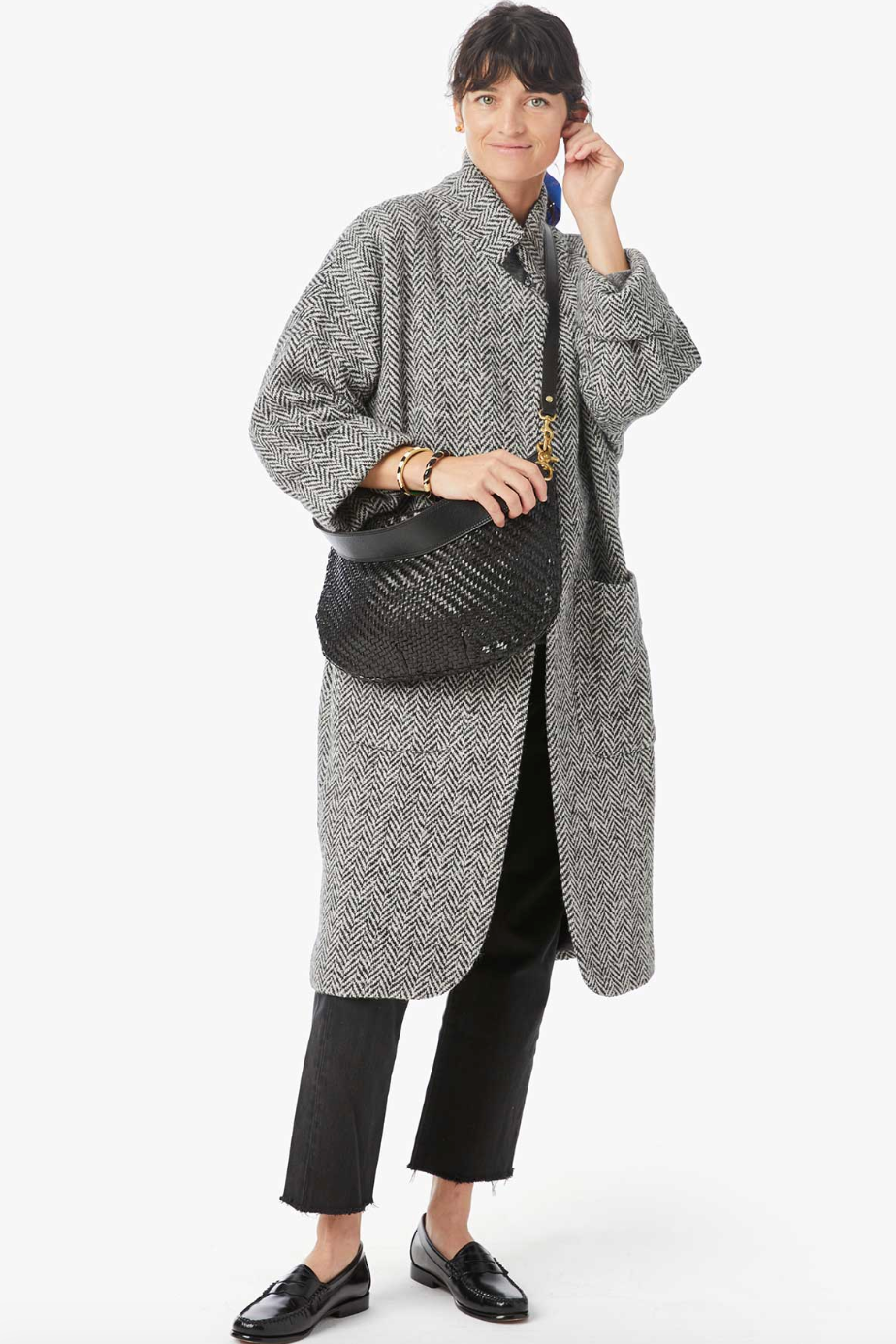 Clare_V_Moyen_Black_Woven_Zig_Zag_Leather_Messenger_Bag_on_figure.png