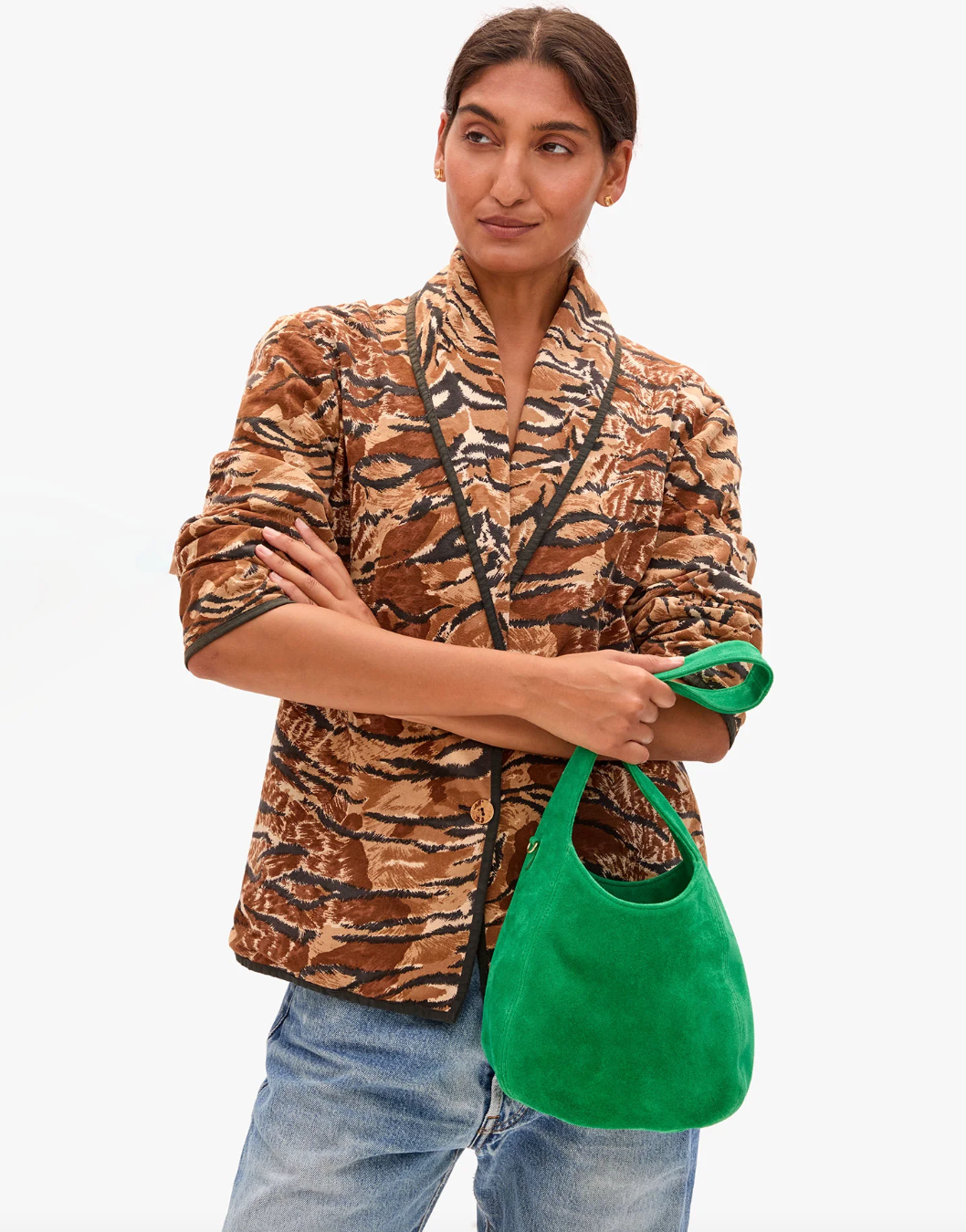 woman holding Petit Bando in Grass Suede