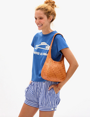woman wearing the Petit Bando in Natural Woven Diagonal
