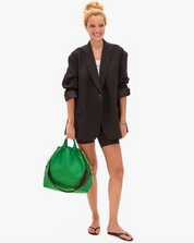 woman holding Sac Tout in Fern Recycled Nylon