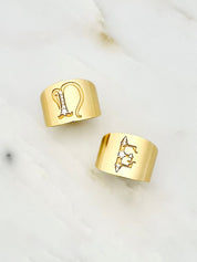 The moonstoned fine jewelry womens 14k yellow gold Diamond Initial Cigar Band