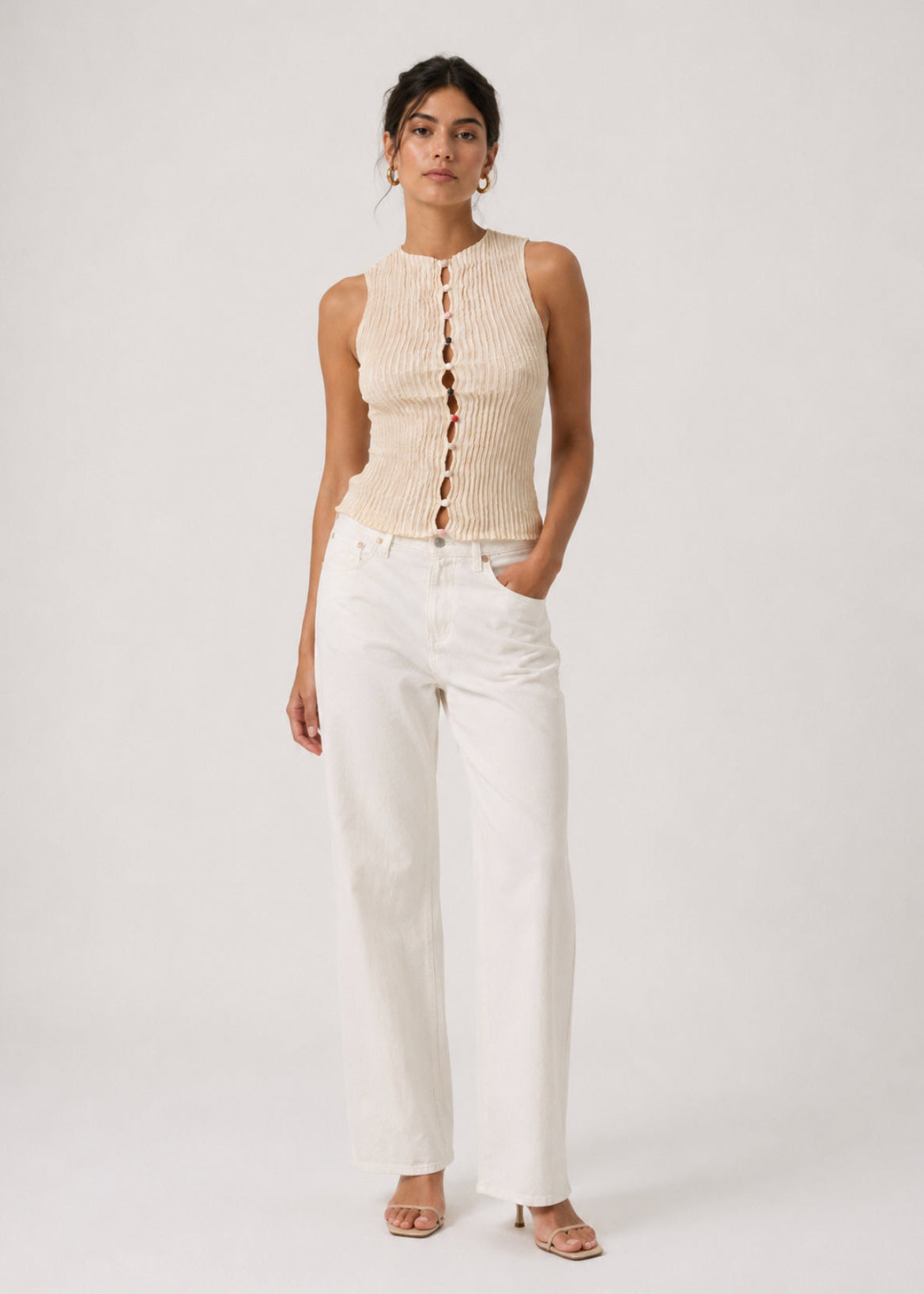 person wearing azur womens Plissé Silk Buttoned Top in Off White
