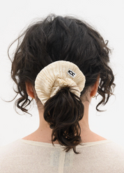 person wearing azur world Plissé Silk Scrunchie in Off White