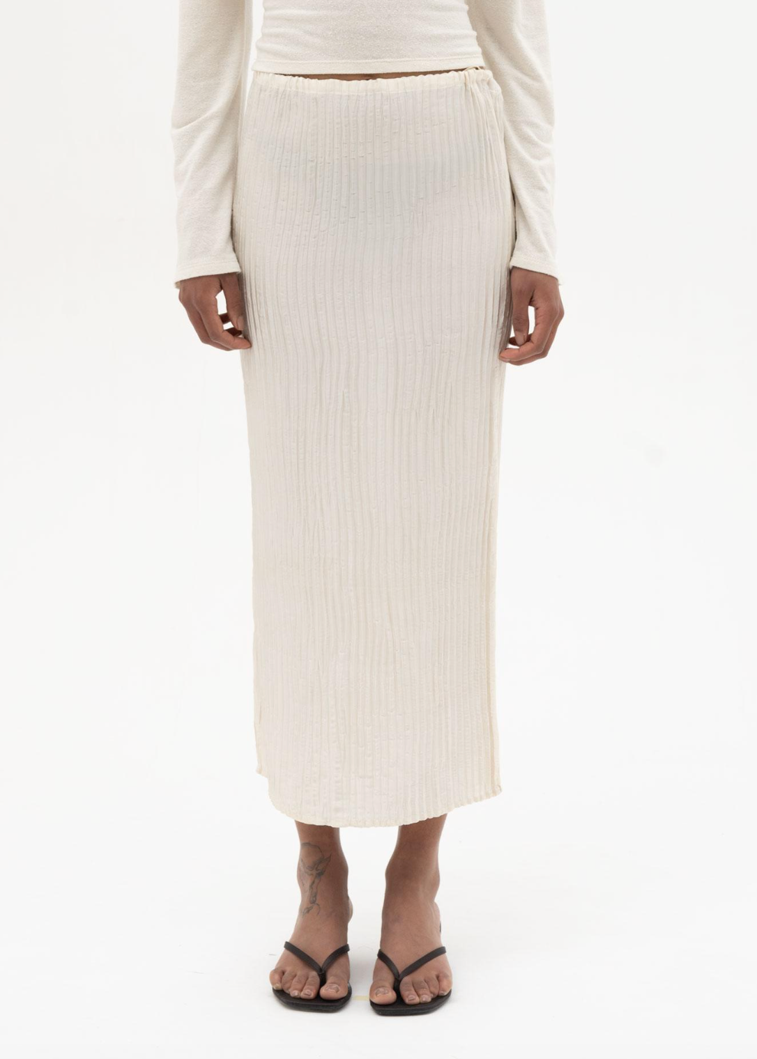person wearing azur world womens Plissé Silk Long Skirt in Off White