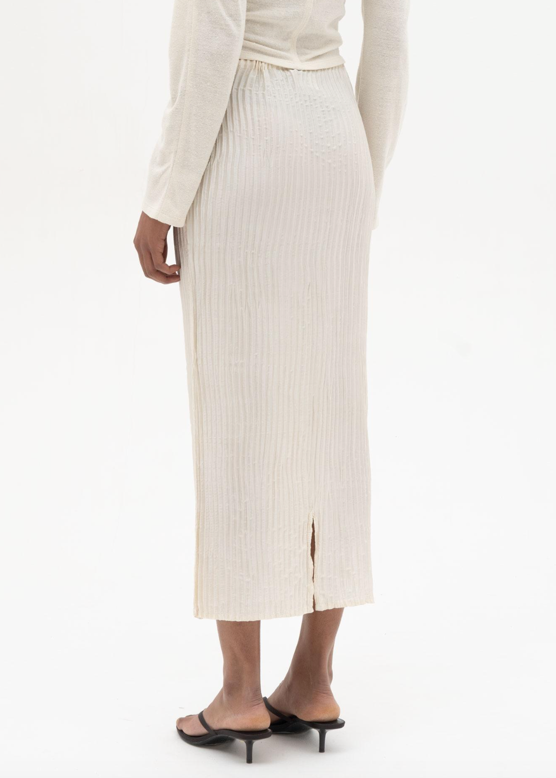 person wearing azur world womens Plissé Silk Long Skirt in Off White