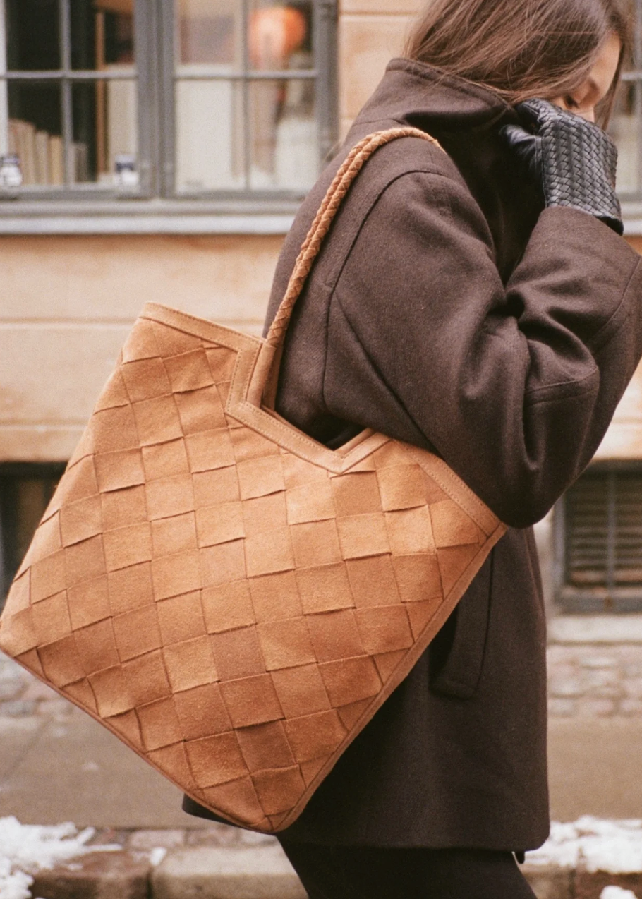 person wearing bembien Camilla Bag Large in Copper Suede