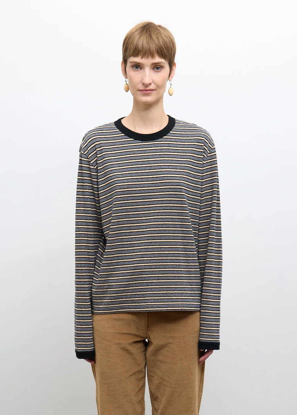 person wearing cawley studio Unisex Japanese Jersey Long Sleeve T-Shirt in Blue Stripe
