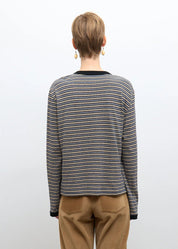 person wearing cawley studio Unisex Japanese Jersey Long Sleeve T-Shirt in Blue Stripe