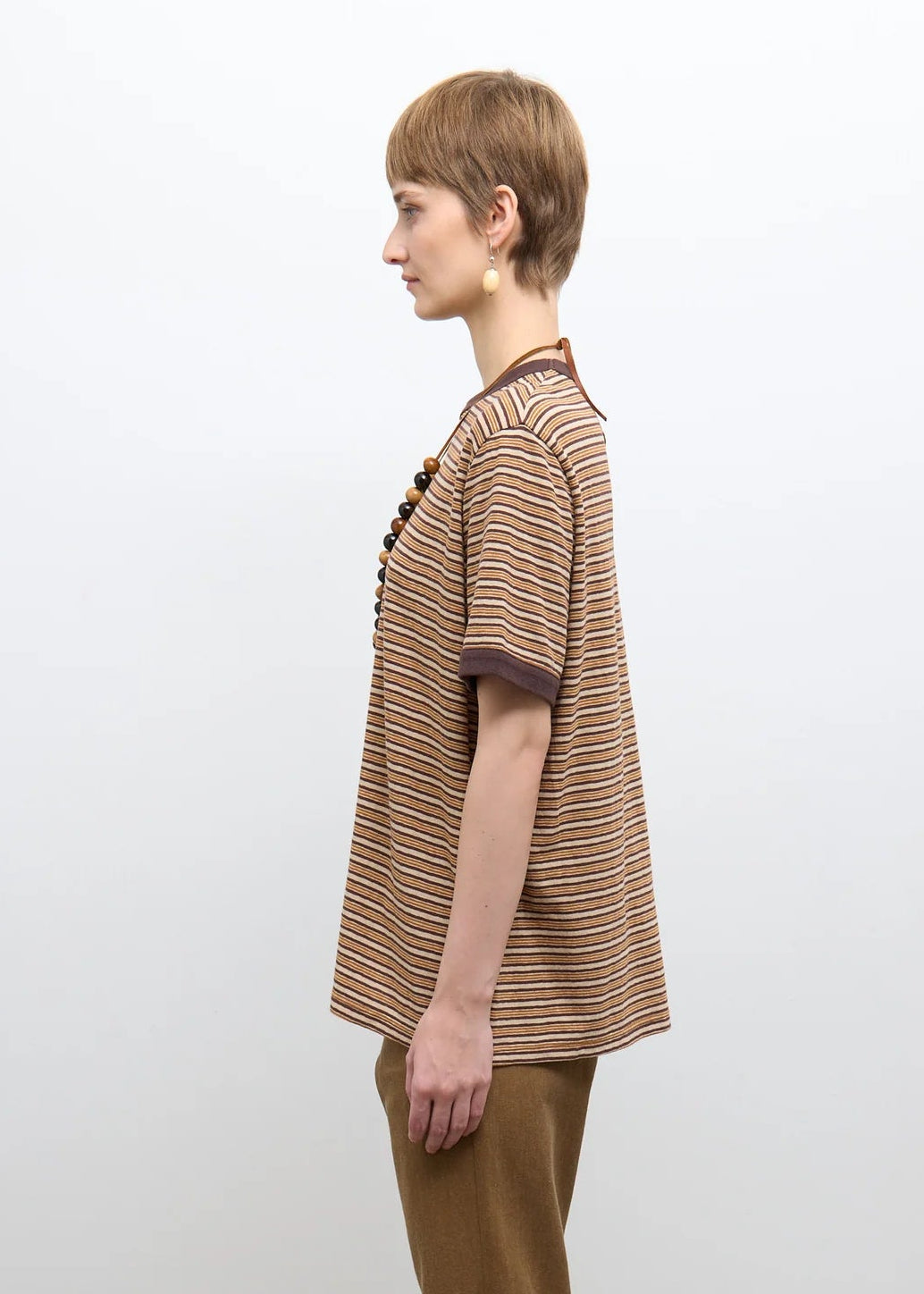 person wearing cawley studio Unisex Japanese Jersey Short Sleeve T-Shirt in Brown Stripe