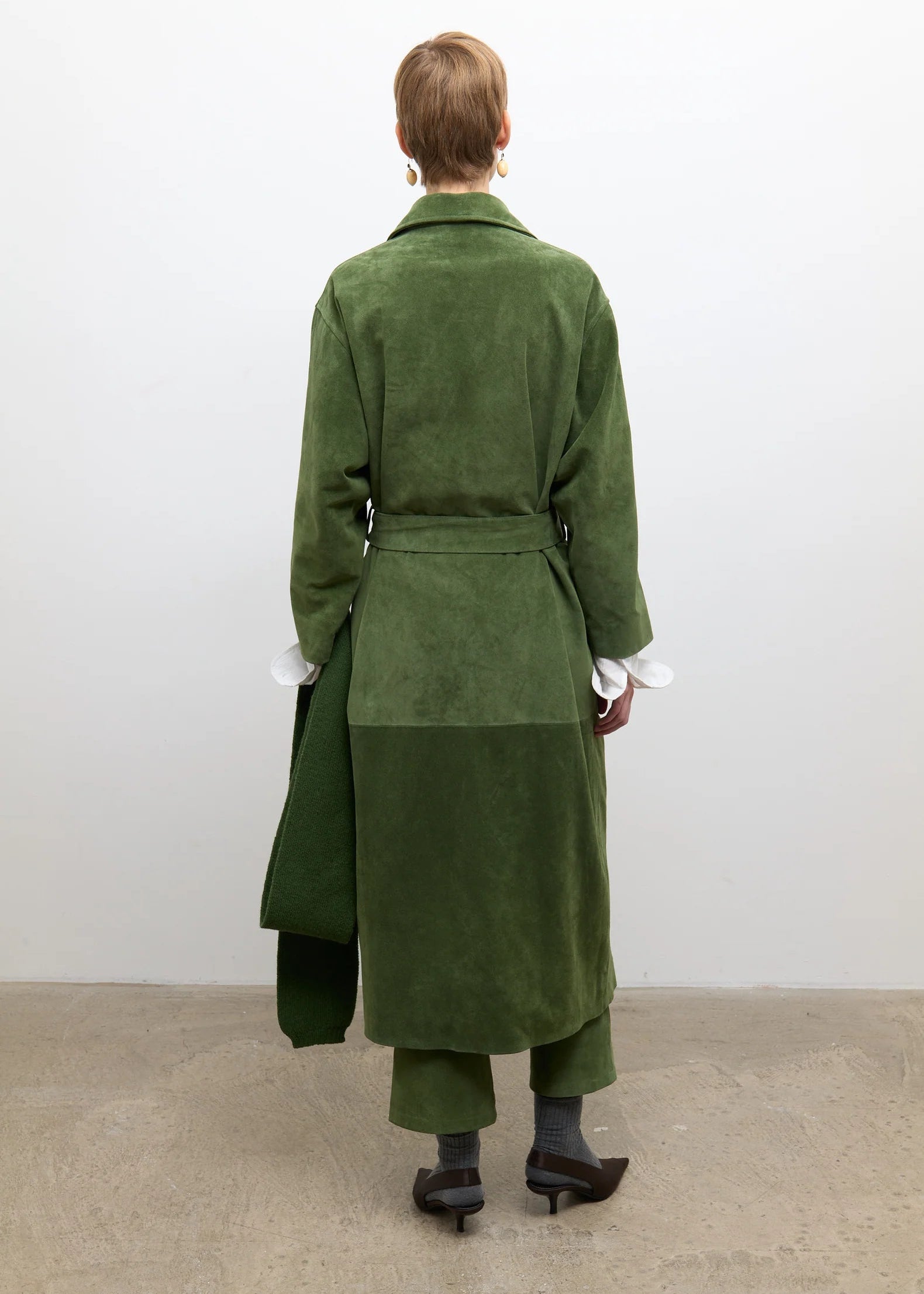 person wearing cawley studio womens Long Quinn Italian Suede Jacket in Olive green