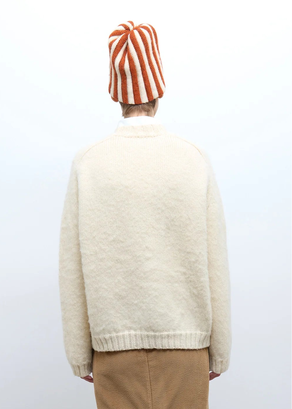 person wearing cawley studio womens mens Brushed British Wool Horse Jumper autumn natural