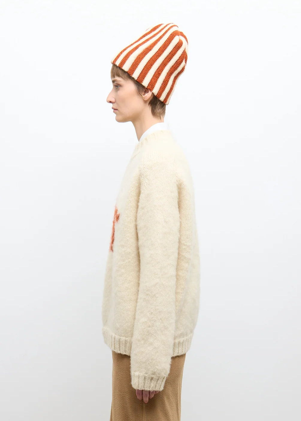person wearing cawley studio womens mens Brushed British Wool Horse Jumper autumn natural