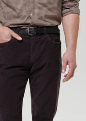 person wearing citizens of humanity mens Elijah Straight Corduroy pants in Charcoal