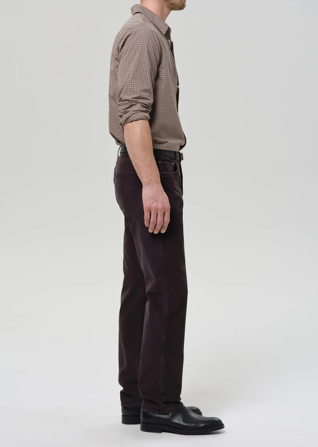 person wearing citizens of humanity mens Elijah Straight Corduroy pants in Charcoal