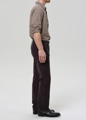 person wearing citizens of humanity mens Elijah Straight Corduroy pants in Charcoal