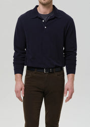 person wearing citizens of humanity mens Long Sleeve Banded Polo In Navy cotton pique