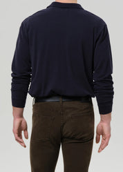 person wearing citizens of humanity mens Long Sleeve Banded Polo In Navy cotton pique