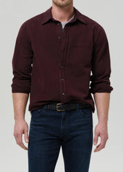 person wearing citizens of humanity mens Long Sleeve Cairo Shirt In Burgundy cotton flax linen