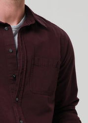 person wearing citizens of humanity mens Long Sleeve Cairo Shirt In Burgundy cotton flax linen