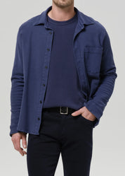 person wearing citizens of humanity mens Luca Bucket Dye Shirt French Terry In Indigo