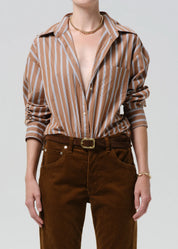 person wearing citizens of humanity womens japanese cotton Thea Boyfriend Shirt In Copper Stripe