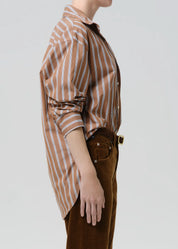person wearing citizens of humanity womens japanese cotton Thea Boyfriend Shirt In Copper Stripe