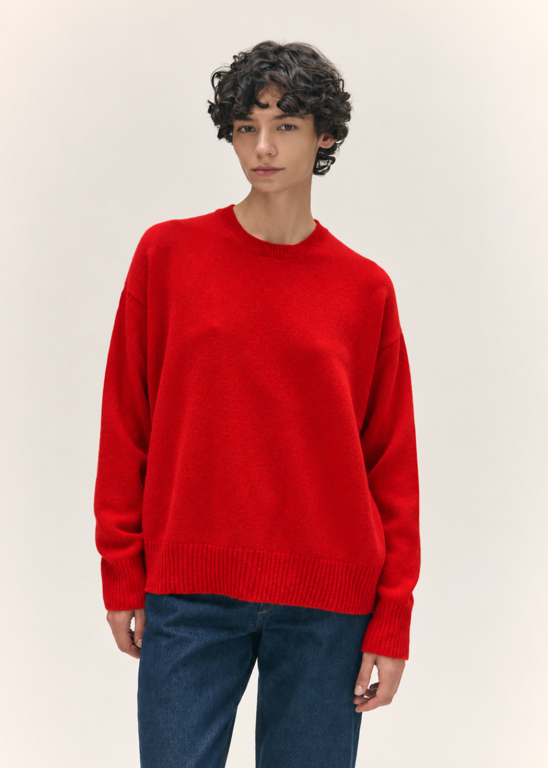 person wearing &daughter womens geelong lambswool Innes Slouch Crewneck sweater in Poppy Red