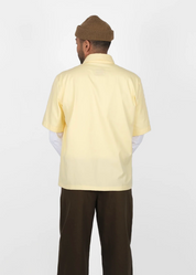 person wearing dehen 1920 mens Short Sleeve Skyliner Shirt in Lemon Twill
