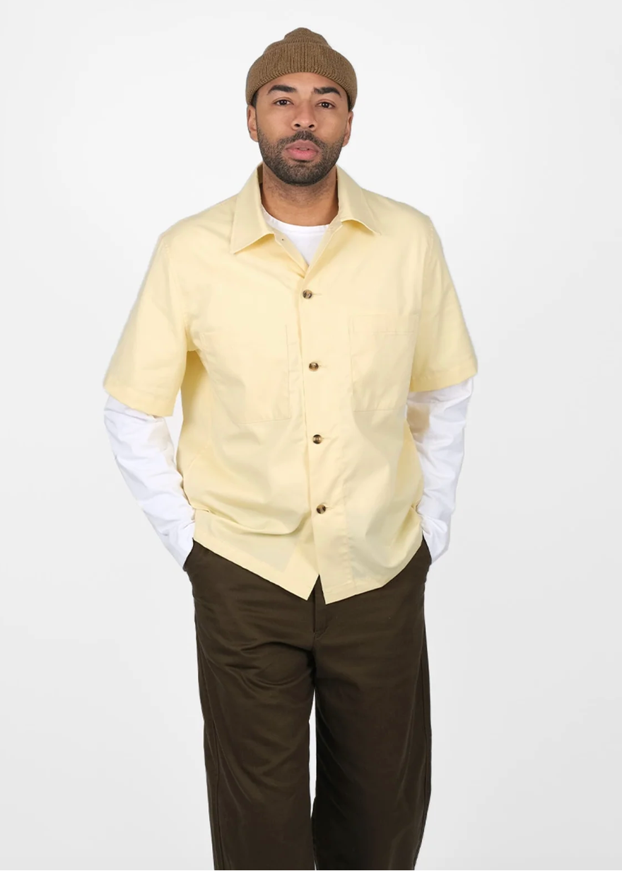 person wearing dehen 1920 mens Short Sleeve Skyliner Shirt in Lemon Twill