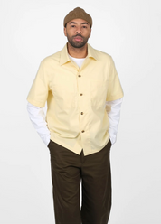 person wearing dehen 1920 mens Short Sleeve Skyliner Shirt in Lemon Twill
