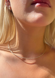 person wearing dunton ellerkamp jewelry Tension Collar Necklace in Silver