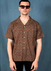 person wearing dushyant mens 'The Don' Short Sleeve Camp Shirt in Barmer Abstract Print