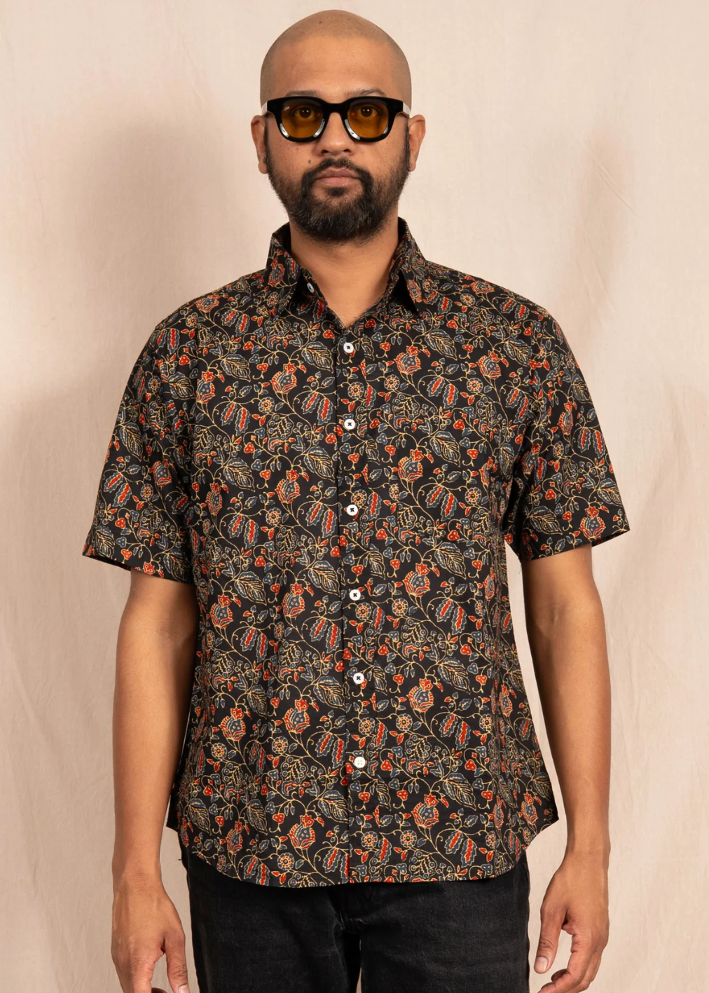 person wearing dushyant mens 'The Folk' Short Sleeve Pocket Shirt in Black Mughal Floral Print