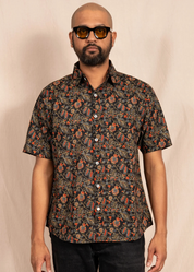 person wearing dushyant mens 'The Folk' Short Sleeve Pocket Shirt in Black Mughal Floral Print