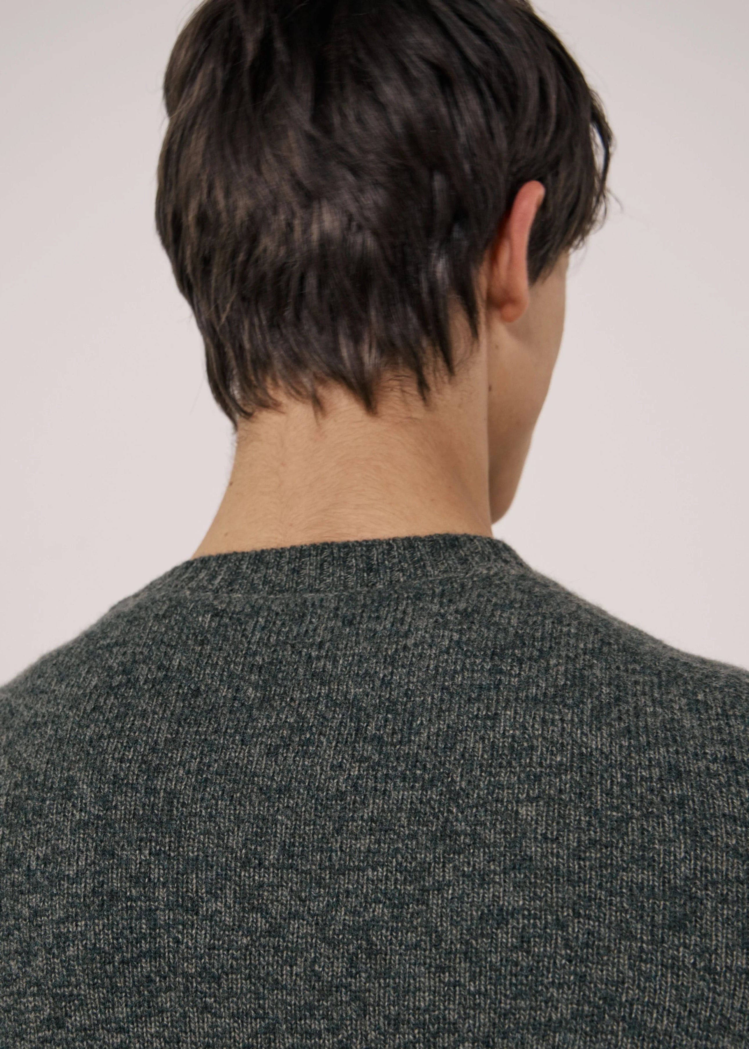 person wearing hartford mens Seamless Crew Men's Camo Green Extra-Fine Merino Wool Sweater camo green