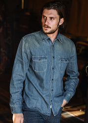 person wearing hiroshi kato mens The Brace Shirt 7oz Denim Shirt in Craig Wash