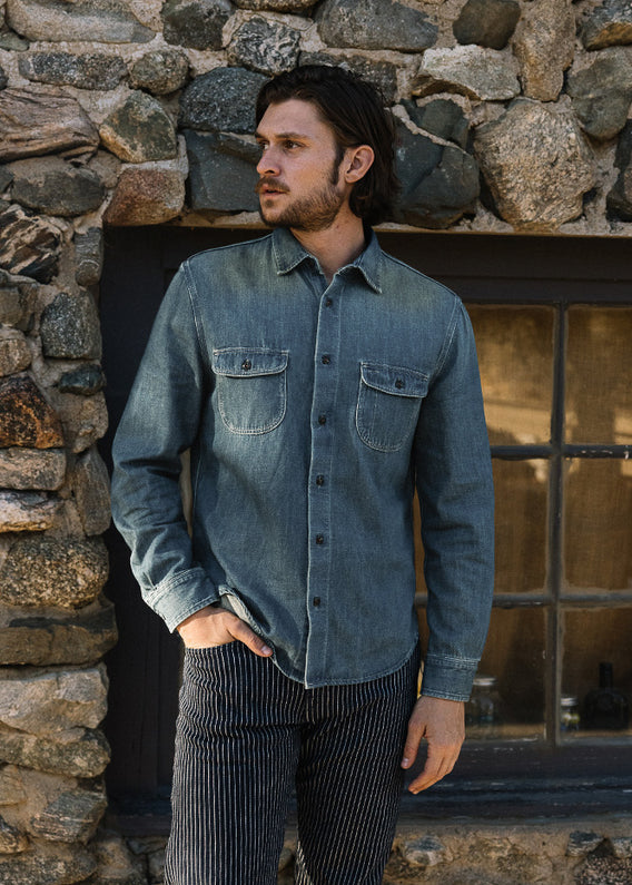 person wearing hiroshi kato mens The Brace Shirt 7oz Denim Shirt in Craig Wash