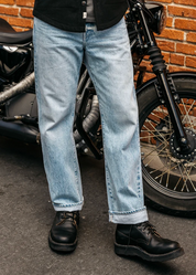 person wearing hiroshi kato mens The Pail Loose Straight 14.5oz Teacore Selvedge Jeans in Zoli Wash