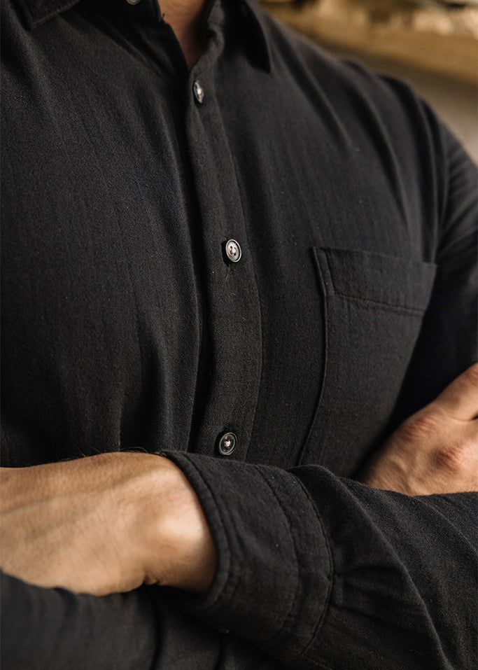 person wearing hiroshi kato mens The Ripper Double Gauze Shirt in Black