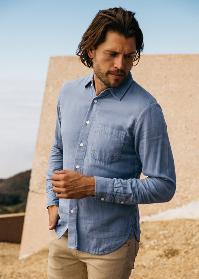 person wearing hiroshi kato mens The Ripper Double Gauze Shirt in Matte Blue