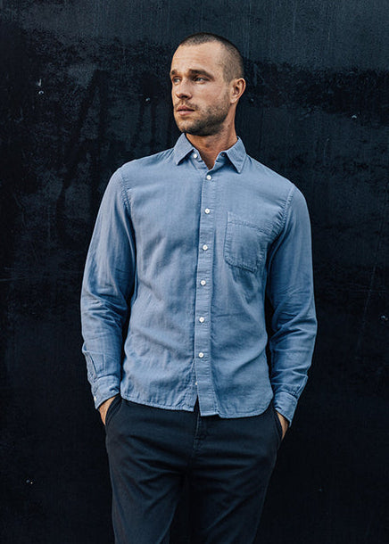 person wearing hiroshi kato mens The Ripper Double Gauze Shirt in Matte Blue