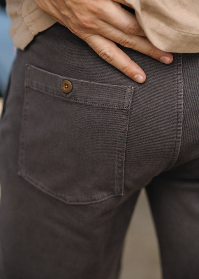person wearing hiroshi kato mens The Scout 8" Denit® Fatigue Shorts in Iron Gray