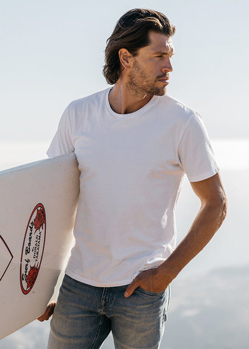 person wearing hiroshi kato mens The Stamp 9oz Organic Cotton Tee in Shell