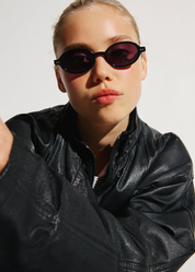 person wearing jimmy fairly paris unisex sunglasses The Elvie in Black