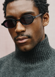 person wearing jimmy fairly paris unisex sunglasses The Elvie in Black
