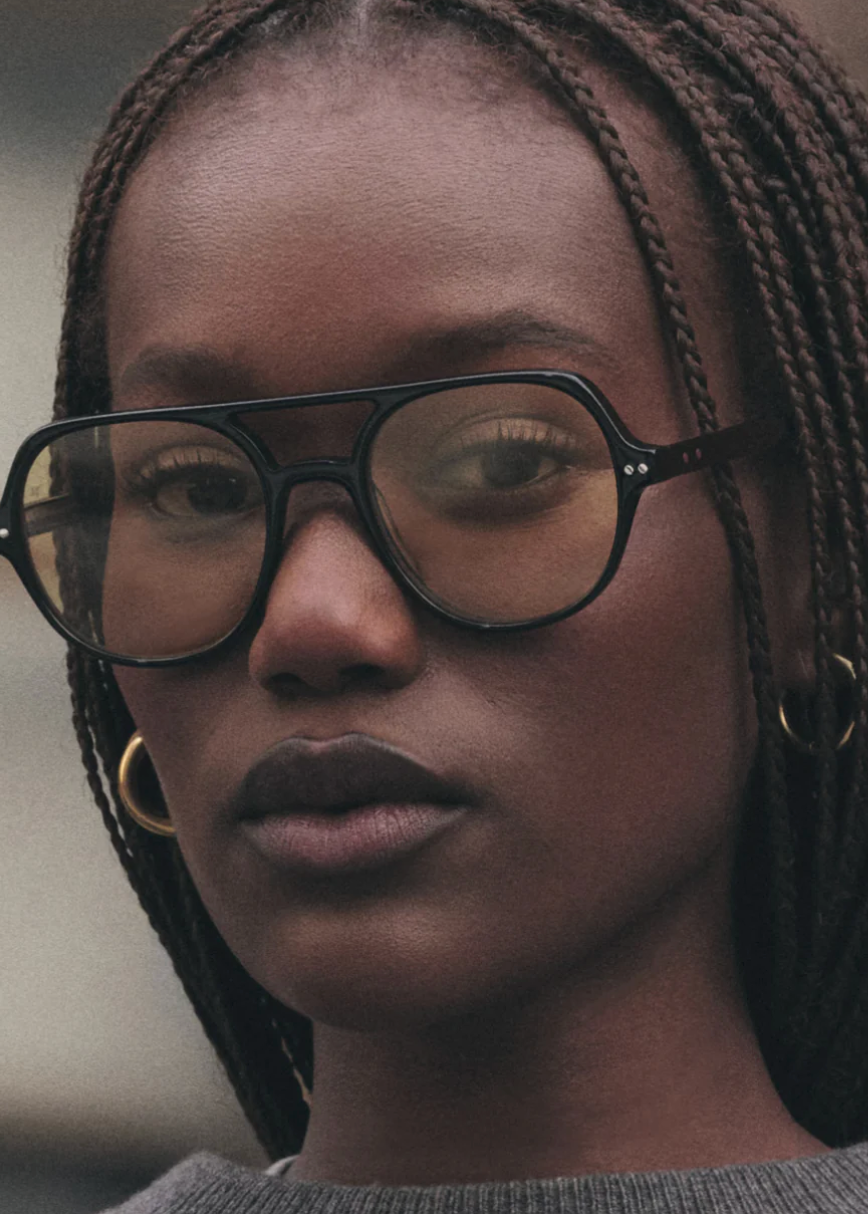 person wearing jimmy fairly paris unisex sunglasses The Lars in Black yellow lens