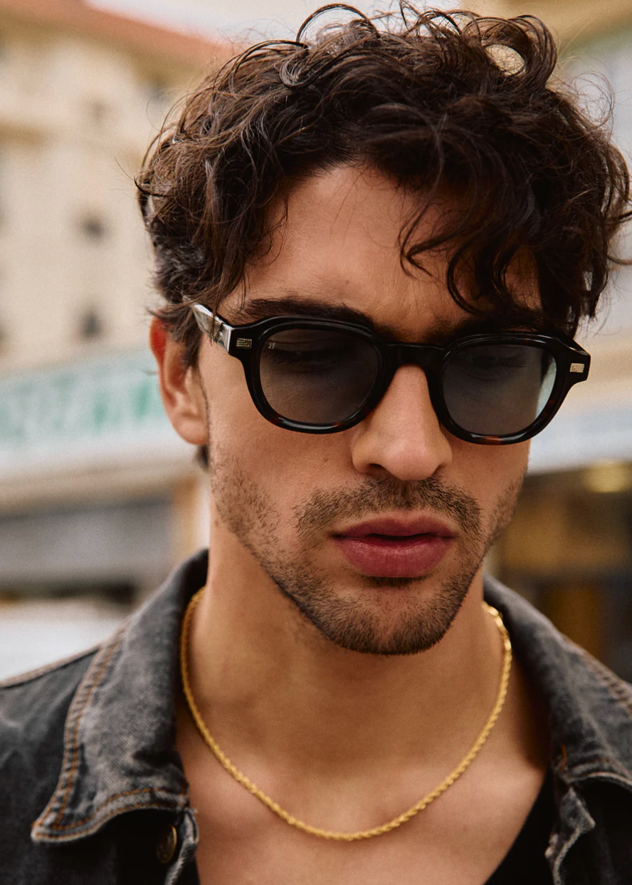 person wearing jimmy fairly unisex sunglasses The Napoli in Dark Tortoise