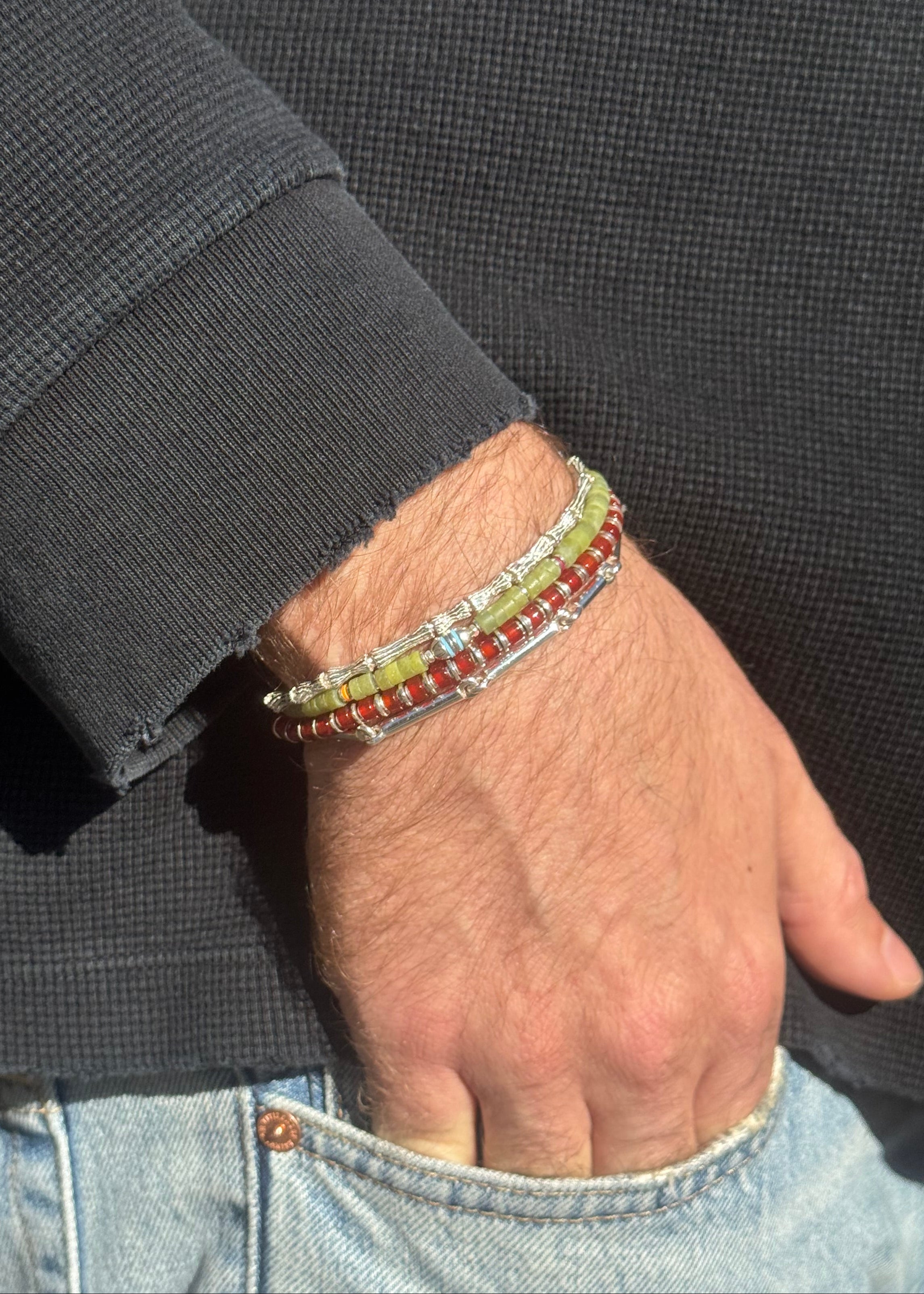 person wearing maor mens jewelry Orion Bracelet in Silver green jade bracelet timor bracelet in silver Citrine Sapet Bracelet in Silver