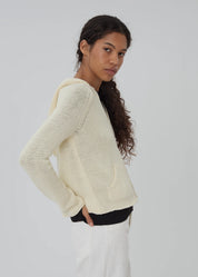 person wearing still here new york womens Bear Zip Up in Cream